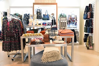 dresses and purses at gift shop