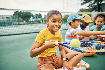 Pavilion Kids Camps kid playing tennis